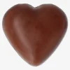 Cuori di cioccolato al latte in rete con ripieno di crema al latte