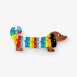 Puzzle in legno dell'alfabeto del cane salsiccia