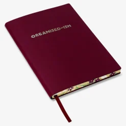 Quaderno bordeaux con scritta