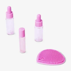Set da viaggio rosa con flaconi dosatori - 4 pz